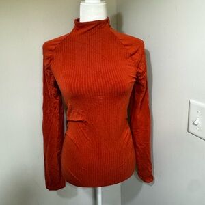 By Anthropologie fitted turtleneck top